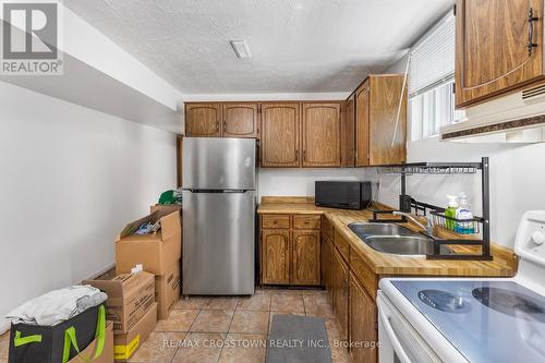 107 Fred Cook Drive, Bradford West Gwillimbury (Bradford), ON - Indoor Photo Showing Kitchen With Double Sink