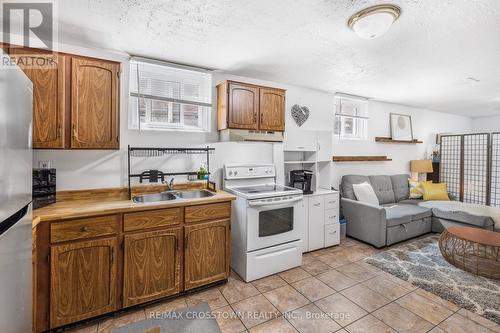 107 Fred Cook Drive, Bradford West Gwillimbury (Bradford), ON - Indoor Photo Showing Kitchen With Double Sink