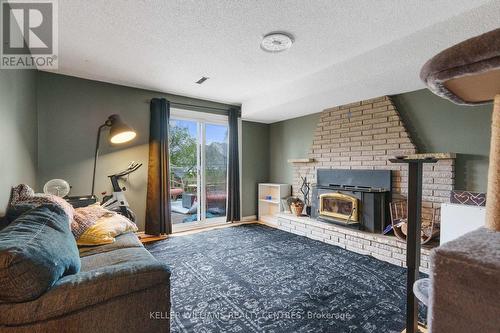 16 Gosney Crescent W, Barrie (Painswick North), ON - Indoor Photo Showing Living Room With Fireplace