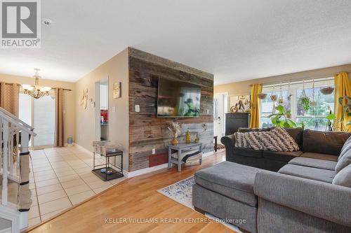 16 Gosney Crescent W, Barrie, ON - Indoor Photo Showing Living Room With Fireplace