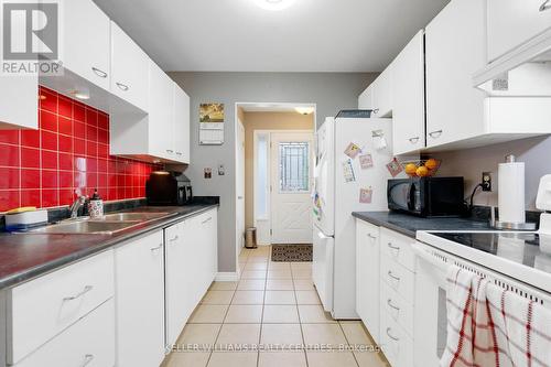 16 Gosney Crescent W, Barrie (Painswick North), ON - Indoor Photo Showing Kitchen With Double Sink