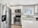 113-8800 Dallas Drive, Kamloops, BC  - Indoor Photo Showing Kitchen With Double Sink With Upgraded Kitchen 