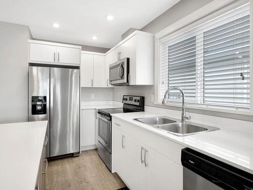 113-8800 Dallas Drive, Kamloops, BC - Indoor Photo Showing Kitchen With Double Sink