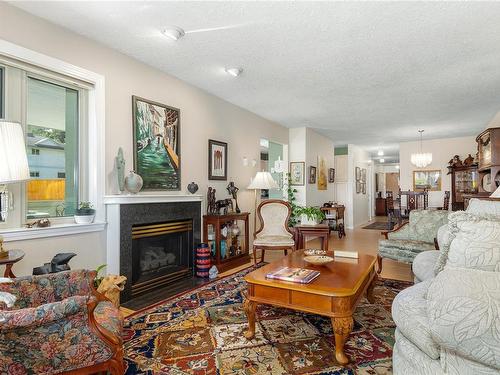 101-700 Island Hwy South, Campbell River, BC - Indoor Photo Showing Living Room With Fireplace