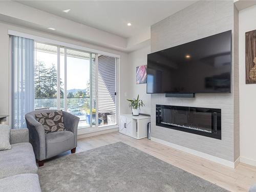 210-958 Pharoah Mews, Langford, BC - Indoor Photo Showing Living Room With Fireplace