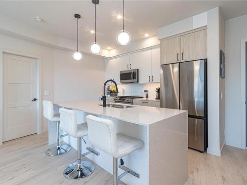 210-958 Pharoah Mews, Langford, BC - Indoor Photo Showing Kitchen With Double Sink With Upgraded Kitchen