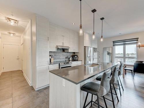 Cuisine - 403-130 Av. De La Belle-Dame, La Prairie, QC - Indoor Photo Showing Kitchen With Upgraded Kitchen