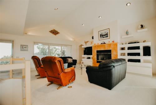 307 Sandpiper Court, Kelowna, BC - Indoor Photo Showing Living Room With Fireplace