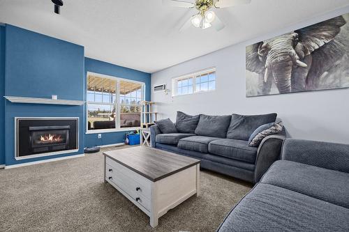 27-303 Regent Avenue, Enderby, BC - Indoor Photo Showing Living Room With Fireplace