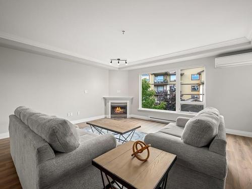 536-3666 Royal Vista Way, Courtenay, BC - Indoor Photo Showing Living Room With Fireplace