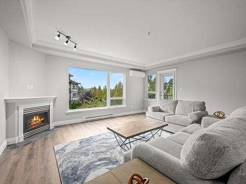 536-3666 Royal Vista Way, Courtenay, BC - Indoor Photo Showing Living Room With Fireplace