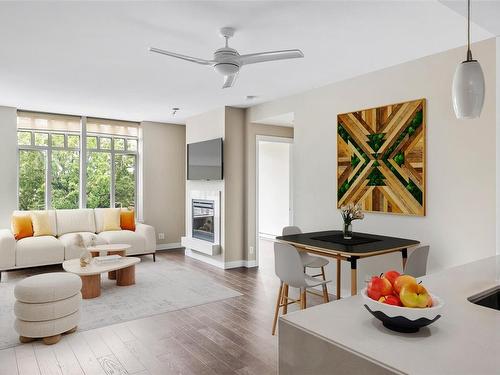 401-999 Burdett Ave, Victoria, BC - Indoor Photo Showing Living Room With Fireplace