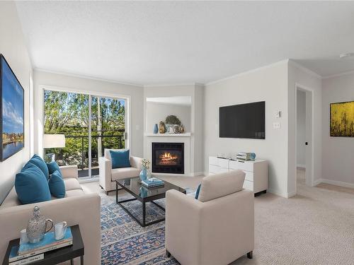 201-1039 Caledonia Ave, Victoria, BC - Indoor Photo Showing Living Room With Fireplace