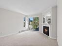 201-1039 Caledonia Ave, Victoria, BC  - Indoor Photo Showing Living Room With Fireplace 