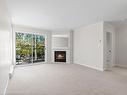 201-1039 Caledonia Ave, Victoria, BC  - Indoor Photo Showing Living Room With Fireplace 