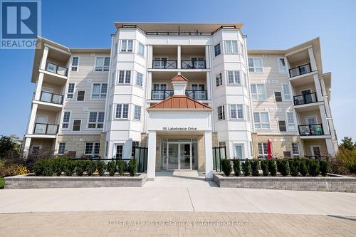 314 - 50 Lakebreeze Drive, Clarington (Newcastle), ON - Outdoor With Balcony With Facade