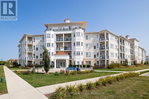 314 - 50 Lakebreeze Drive, Clarington (Newcastle), ON - Outdoor With Balcony With Facade