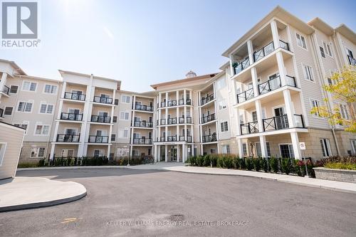 314 - 50 Lakebreeze Drive, Clarington (Newcastle), ON - Outdoor With Balcony With Facade