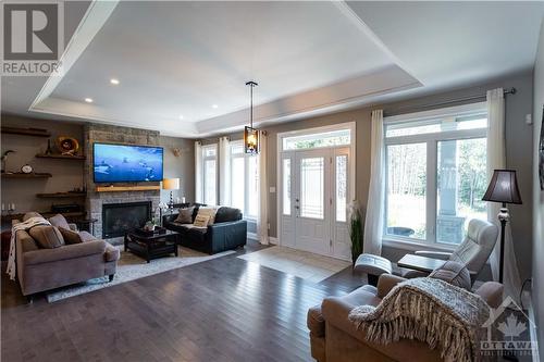 2070 8Th Line Road, Ottawa, ON - Indoor Photo Showing Living Room With Fireplace