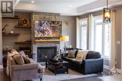 2070 8Th Line Road, Ottawa, ON - Indoor Photo Showing Living Room With Fireplace