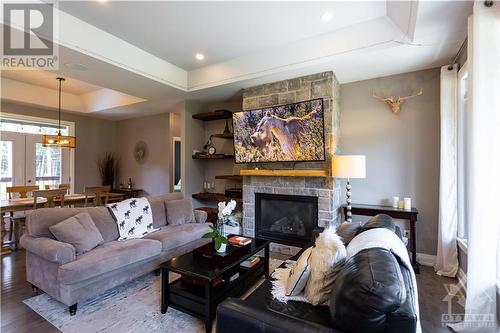 2070 8Th Line Road, Ottawa, ON - Indoor Photo Showing Living Room With Fireplace