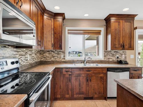 1036 Quails Roost Crt, Kamloops, BC - Indoor Photo Showing Kitchen With Double Sink