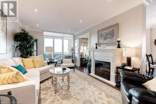 5250 Lakeshore Road Unit# 2006, Burlington, ON - Indoor Photo Showing Living Room With Fireplace