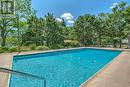 5250 Lakeshore Road Unit# 2006, Burlington, ON  - Outdoor With In Ground Pool With Backyard 