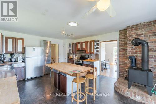 60 Percy Lane, Trent Hills (Campbellford), ON - Indoor Photo Showing Kitchen With Fireplace With Double Sink