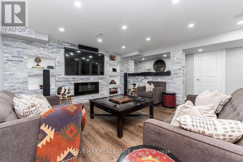 23 Warman Street, New Tecumseth, ON - Indoor Photo Showing Living Room With Fireplace