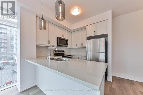 705 - 460 Dundas Street E, Hamilton, ON - Indoor Photo Showing Kitchen With Double Sink