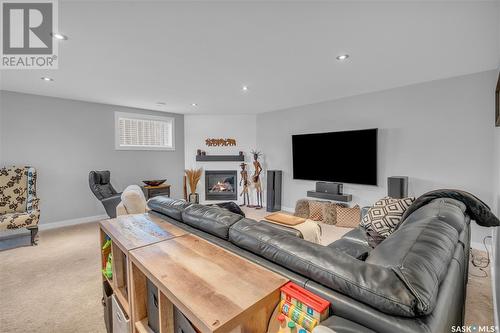 4103 Freeman Road E, Regina, SK - Indoor Photo Showing Living Room With Fireplace