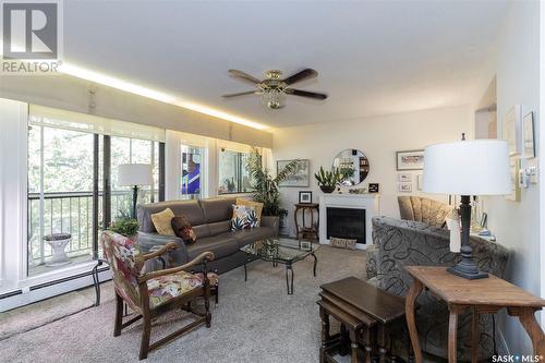 304 525 5Th Avenue N, Saskatoon, SK - Indoor Photo Showing Living Room With Fireplace