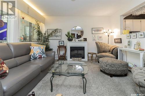 304 525 5Th Avenue N, Saskatoon, SK - Indoor Photo Showing Living Room With Fireplace