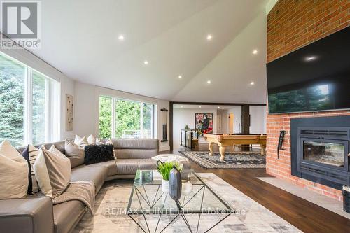 1190 County 3 Road, Prince Edward County (Ameliasburgh), ON - Indoor Photo Showing Living Room With Fireplace