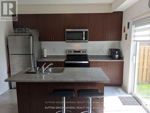 31 Sandhill Crane Drive, Wasaga Beach, ON - Indoor Photo Showing Kitchen With Double Sink With Upgraded Kitchen