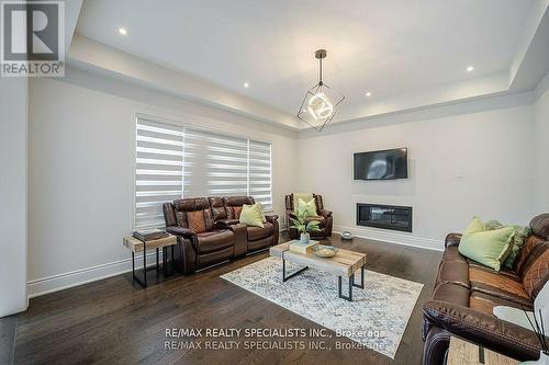 56 Arthur Griffin Crescent, Caledon, ON - Indoor Photo Showing Living Room With Fireplace