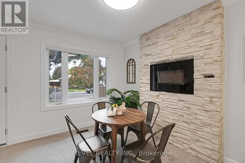 1508 Pharmacy Avenue, Toronto, ON - Indoor Photo Showing Dining Room With Fireplace