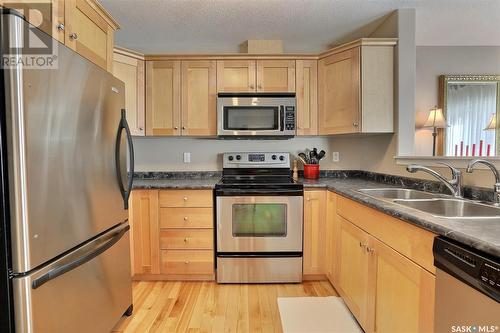 14 2751 Windsor Park Road, Regina, SK - Indoor Photo Showing Kitchen With Double Sink