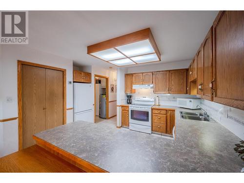 2235 Baskin Street Unit# 101, Penticton, BC - Indoor Photo Showing Kitchen With Double Sink