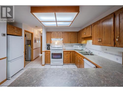 2235 Baskin Street Unit# 101, Penticton, BC - Indoor Photo Showing Kitchen With Double Sink