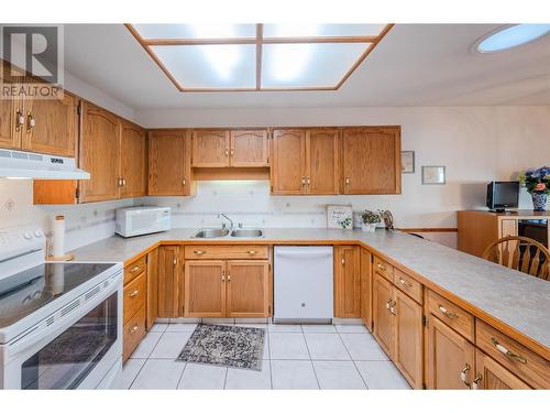 2235 Baskin Street Unit# 101, Penticton, BC - Indoor Photo Showing Kitchen With Double Sink