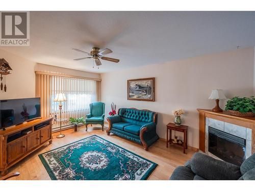 2235 Baskin Street Unit# 101, Penticton, BC - Indoor Photo Showing Living Room With Fireplace