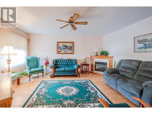 2235 Baskin Street Unit# 101, Penticton, BC - Indoor Photo Showing Living Room With Fireplace