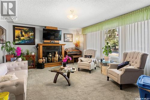 609 King Street, Imperial, SK - Indoor Photo Showing Living Room With Fireplace