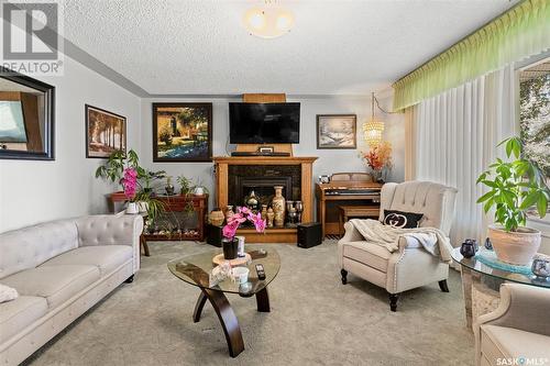 609 King Street, Imperial, SK - Indoor Photo Showing Living Room With Fireplace