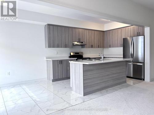 184 Elliot Avenue W, Centre Wellington, ON - Indoor Photo Showing Kitchen With Double Sink