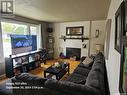 430 Shea Crescent, Saskatoon, SK  - Indoor Photo Showing Living Room With Fireplace 