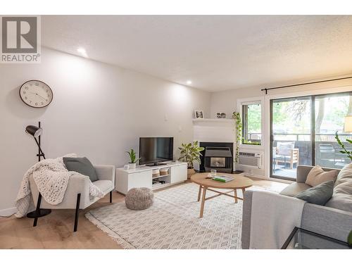 1801 32 Street Unit# 110, Vernon, BC - Indoor Photo Showing Living Room With Fireplace