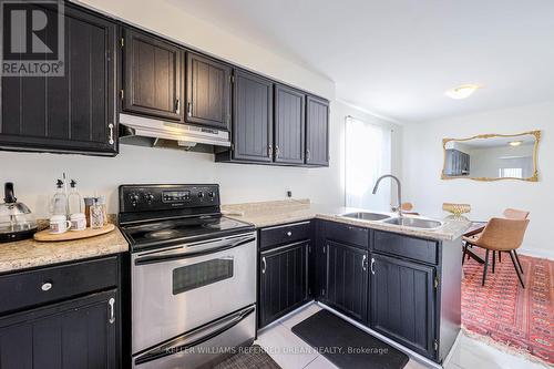 1047 Attersley Drive, Oshawa, ON - Indoor Photo Showing Kitchen With Double Sink